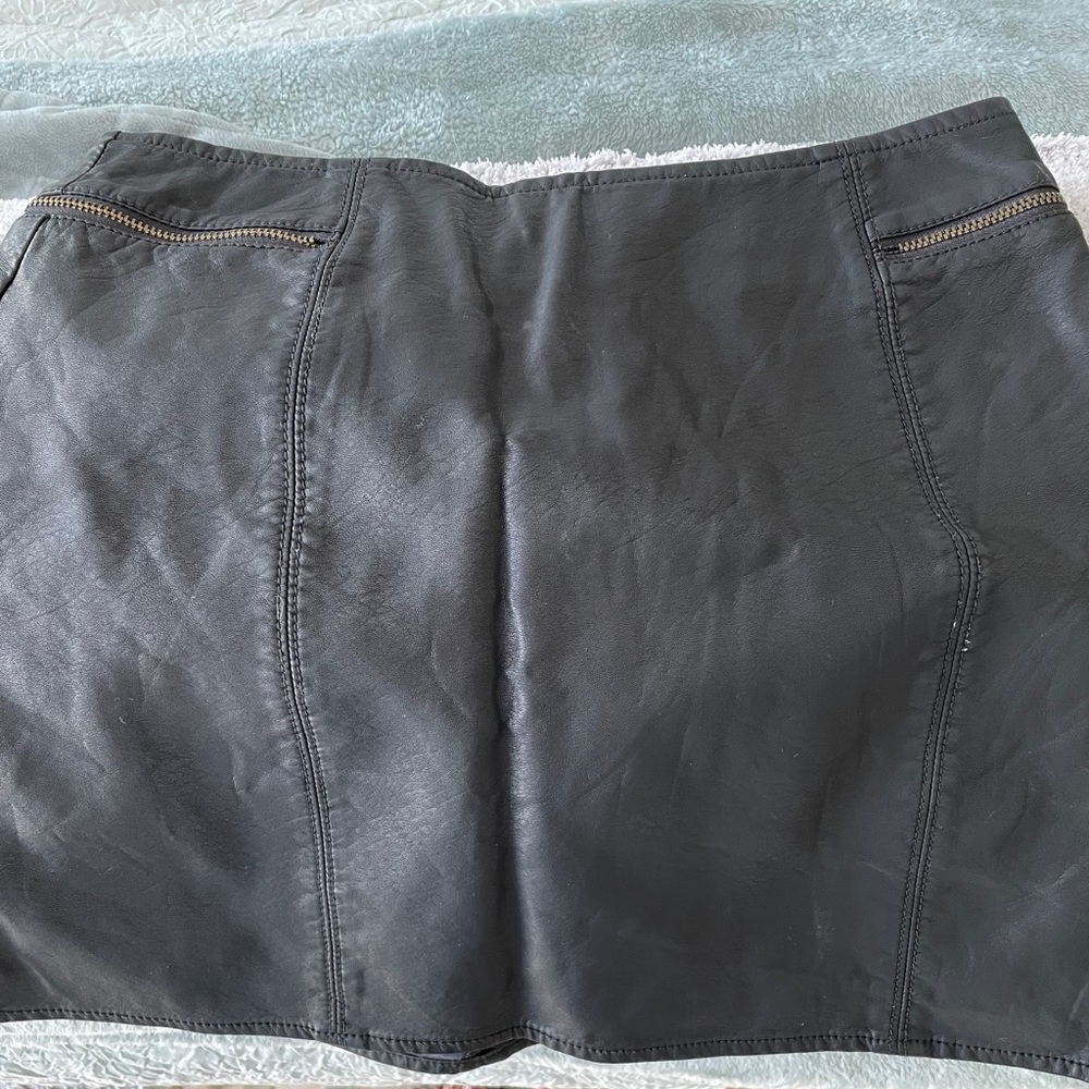 Black pleather skirt.